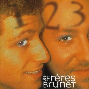 Les Frères Brunet - Un, Deux, Trois men with numbers on their faces.
